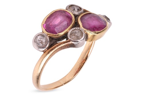 Lot 3 - An Edwardian ruby and diamond crossover ring,...
