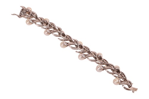 Lot A foliate bracelet set with cultured pearl and...