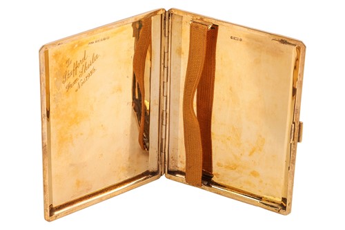 Lot A cigarette case in 9ct gold, of bevelled...