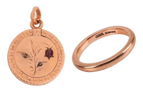 Lot A wedding band and a gem-set locket charm; the...