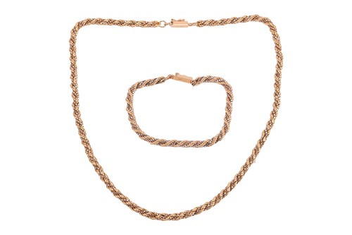 Lot A two-toned twisted rope necklace and bracelet...
