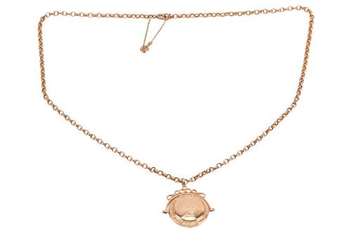 Lot A 9ct gold swivel locket pendant on chain, the...