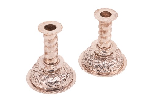 Lot 459 - A pair of Victorian silver candlesticks; in...