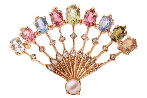 Lot 4 - A gem-set fan brooch, claw-set with a row of...