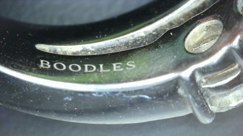 Lot 275 - Boodles - a diamond-set 'Knot' ring in 18ct...