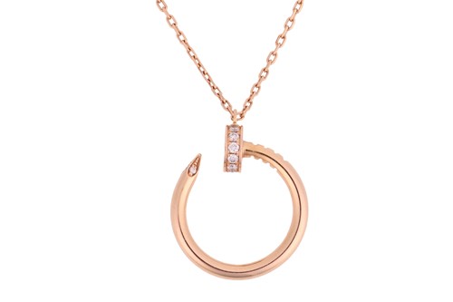 Lot 279 - Cartier - a 'Juste un Clou' pendant on chain,...