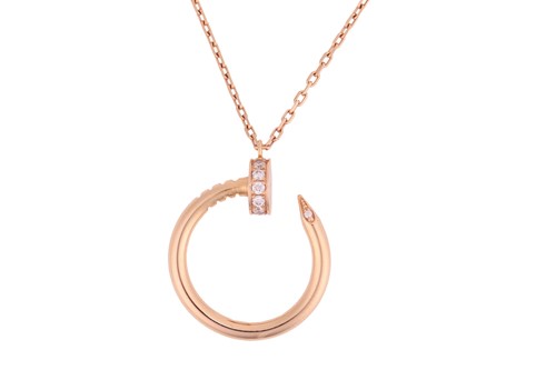 Lot 279 - Cartier - a 'Juste un Clou' pendant on chain,...