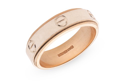 Lot 77 - A 9ct gold ring with screw motifs, the...