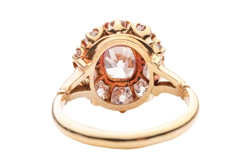 Lot 261 - An old-cut diamond cluster ring, with an...