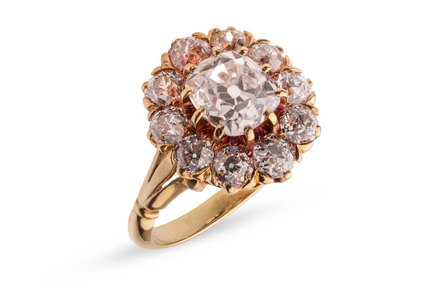 Lot 261 - An old-cut diamond cluster ring, with an...