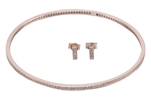 Lot A diamond-set bangle and matching stud...