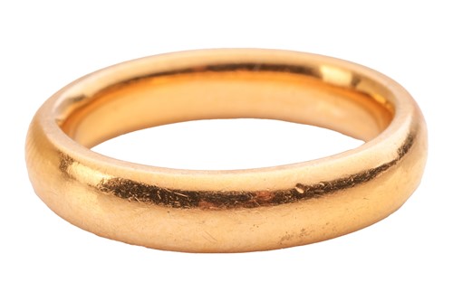 Lot 58 - A 22ct gold band ring, of court profile,...