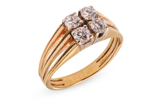 Lot A four-stone diamond cluster ring; featuring...