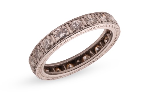 Lot 27 - A diamond eternity ring, with an estimated...