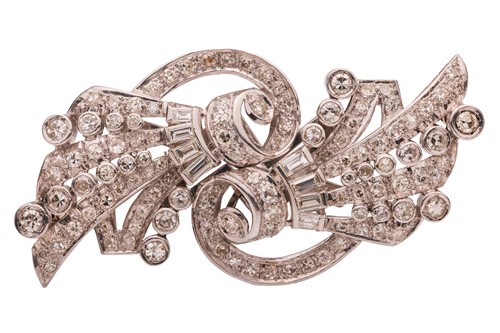 Lot 50 - An Art Deco diamond duette double clip brooch,...