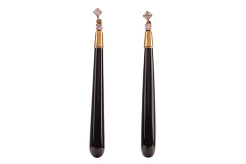 Lot A pair of onyx drop earrings, composed of onyx...