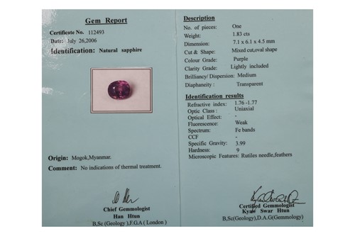 Lot A purple sapphire crossover ring, featuring a...