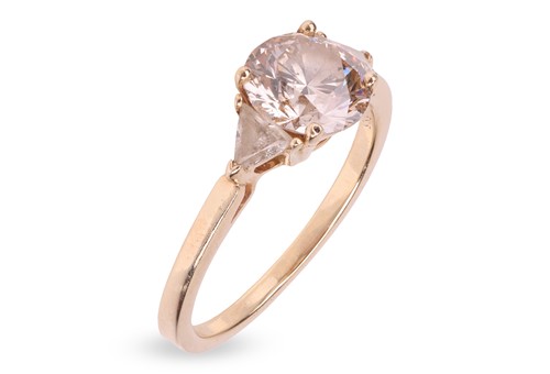 Lot A diamond trilogy ring, with an estimated...