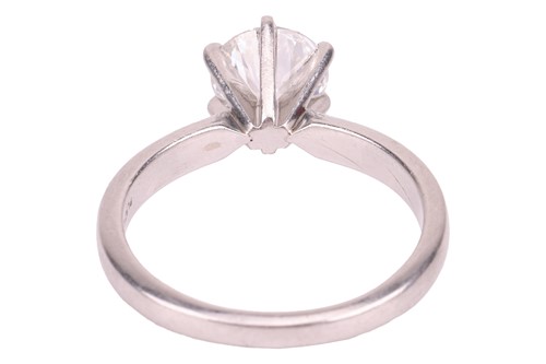 Lot A diamond solitaire ring, centred with a round...