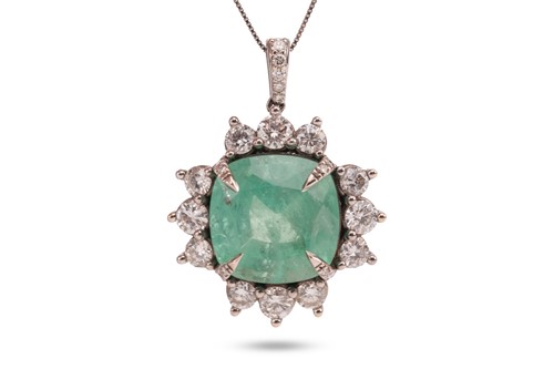 Lot An emerald and diamond pendant, comprising a...