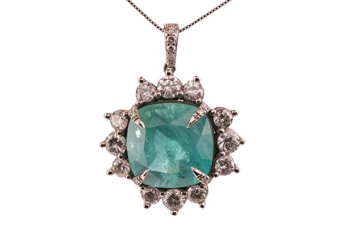 Lot 162 - An emerald and diamond pendant, comprising a...