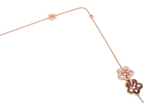 Lot Boodles - a diamond-set "Blossom" opera-length...