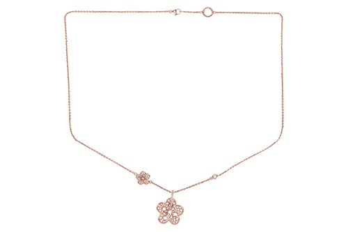 Lot Boodles - a diamond-set "Blossom" pendant on...