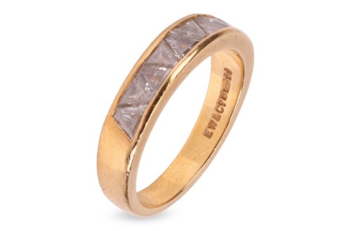 Lot A trillion-cut diamond half eternity ring in...