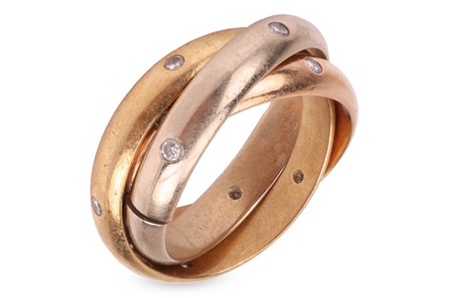 Lot Cartier - a diamond-set trinity ring in 18ct...