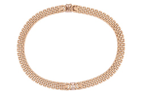 Lot A two-toned brick link necklace in 9ct gold,...