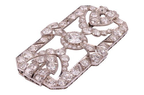 Lot An Edwardian diamond-set brooch, with an...
