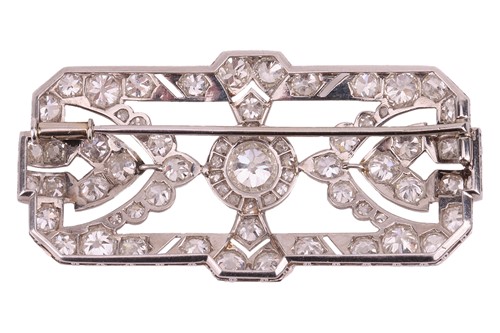 Lot An Edwardian diamond-set brooch, with an...