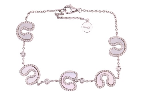 Lot A modern designer mother of pearl and diamond...