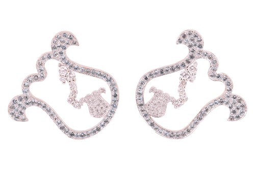 Lot A pair of modern designer pale-blue topaz and...