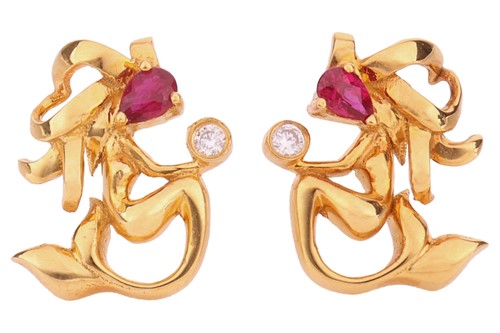 Lot A pair of modern designer ruby and diamond...