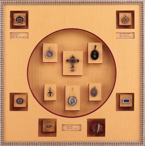 Lot 288 - A framed collection of Victorian mourning...