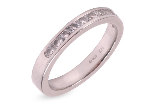 Lot A modern platinum and diamond half-eternity...