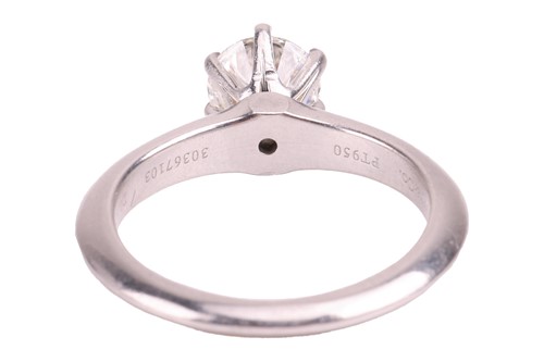 Lot 247 - Tiffany & Co – A diamond solitaire ring,...