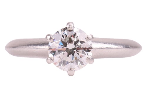 Lot 247 - Tiffany & Co – A diamond solitaire ring,...