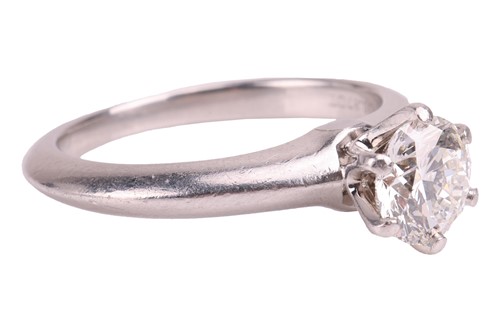 Lot 247 - Tiffany & Co – A diamond solitaire ring,...