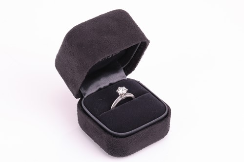Lot 247 - Tiffany & Co – A diamond solitaire ring,...