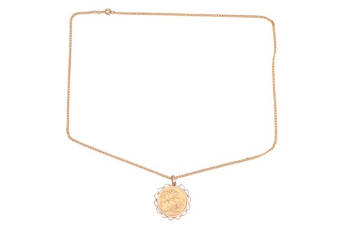 Lot 61 - A 1914 George V full sovereign in a detachable...