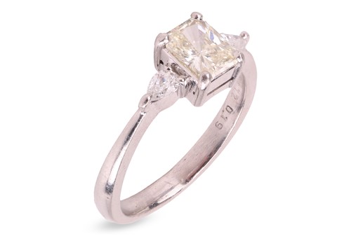 Lot 160 - A platinum and diamond three stone ring,...