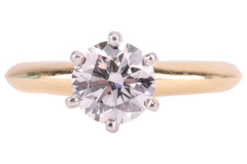 Lot 199 - Tiffany & Co. - a diamond solitaire ring, with...
