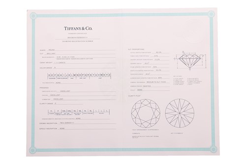 Lot 199 - Tiffany & Co. - a diamond solitaire ring, with...