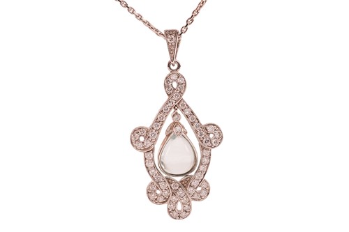 Lot An aquamarine and diamond-set pendant,...