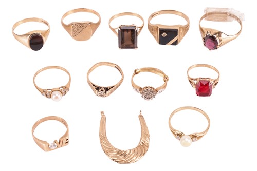 Lot 39 - A group of gem-set rings, to include two 9ct...