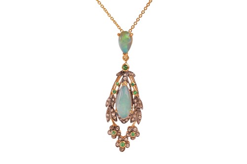 Lot A gem-set garland pendant on chain, the drop...
