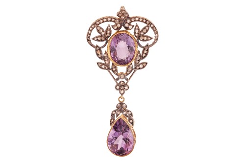 Lot An amethyst and diamond drop pendant, of...