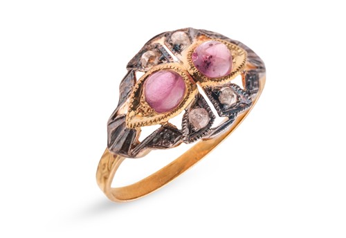 Lot A ruby cabochon and rose-cut diamond dress...
